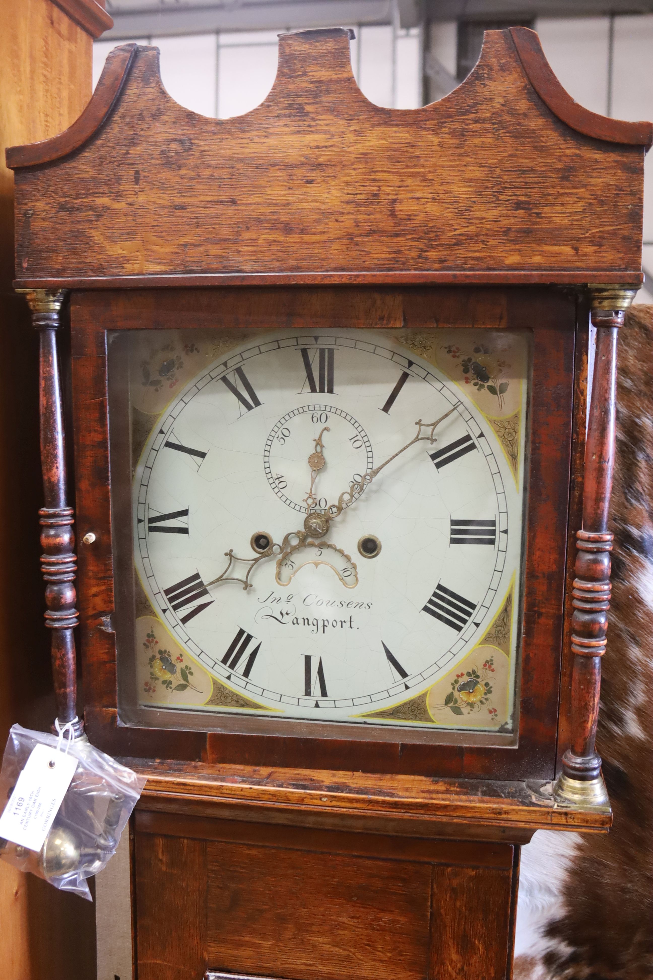 An early 19th century oak eight day longcase clock, marked Cousens Langport, height 194cm